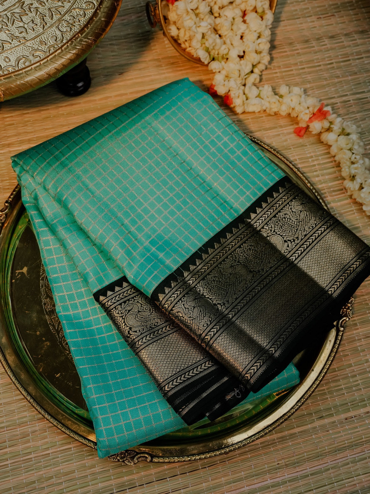 Turquoise Blue Saree with Black and Gold Border