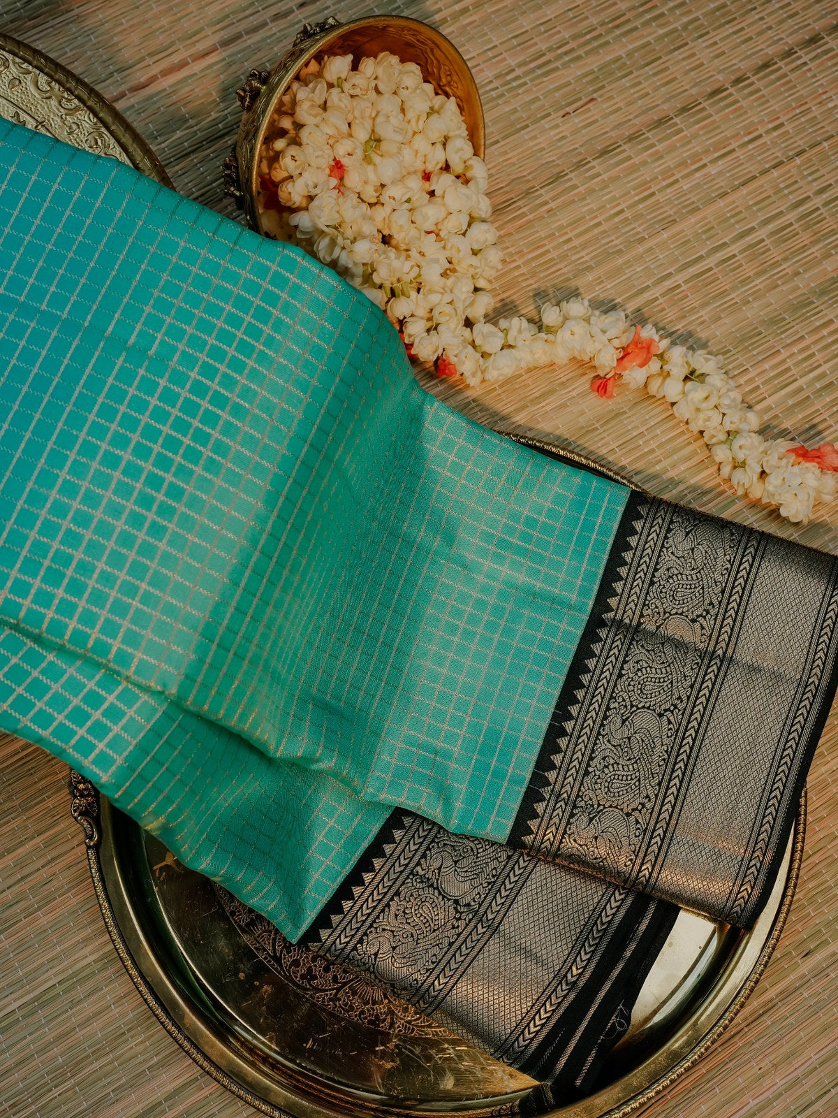 Turquoise Blue Saree with Black and Gold Border