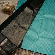 Turquoise Blue Saree with Black and Gold Border