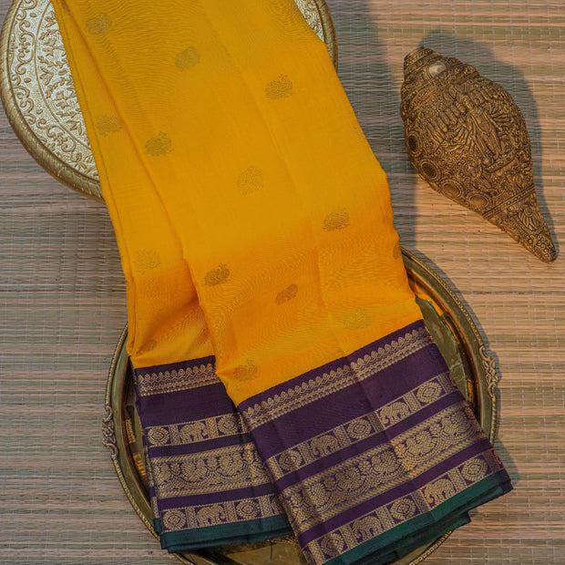 Mustard Yellow Kanchipuram Silk Saree with Purple Elephant Border