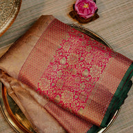 Rani Pink Saree with Gold Floral Motifs and Green Border