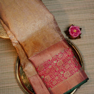 Rani Pink Saree with Gold Floral Motifs and Green Border