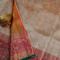 Rani Pink Saree with Gold Floral Motifs and Green Border